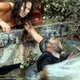 Jennifer Lopez reaching for Ice Cube as he's attacked in the 1997 film Anaconda (Photo: Columbia Pictures/Getty Images)